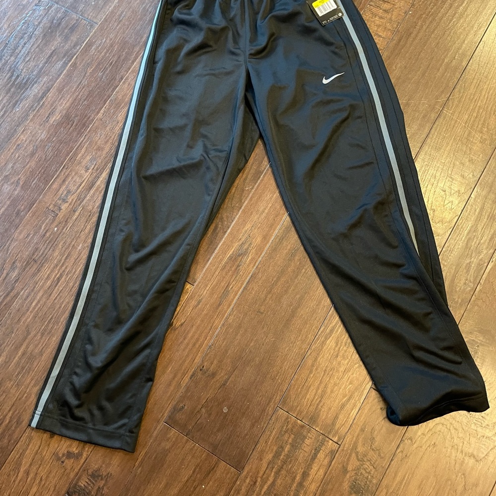 nike men’s sweatpants 100% polyester black with gray strip Small